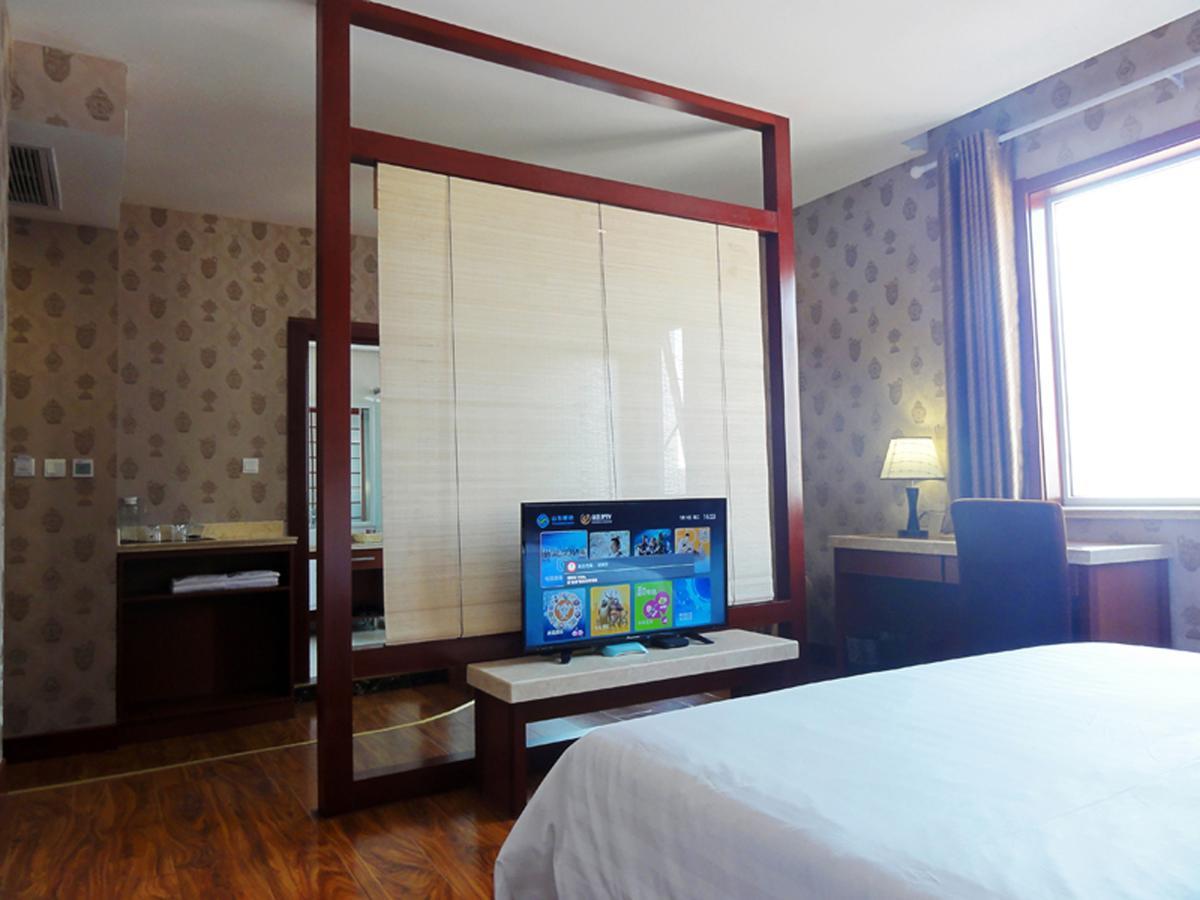 Hua Qi Kaiserdom Hotel Zhongshan Road St Michael'S Cathedral And Zhanqiao Pier Qingdao Exterior foto